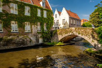 Fototapeta na wymiar Bruges (Brugge) cityscape with water canal and bridge