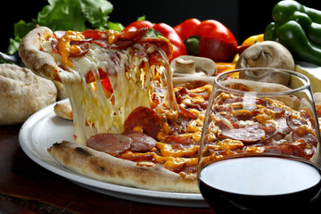 Slice of pizza raised