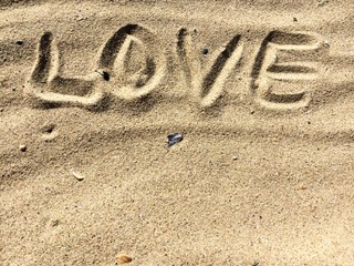 Love letters and sings on a sand
