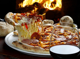 Slice of pizza raised