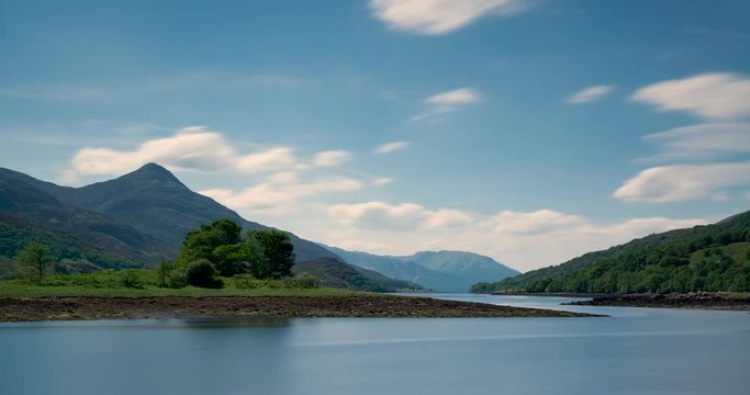 timelapse of clouds moving over loch leven near glencoe showing the pap of glencoe in scotland