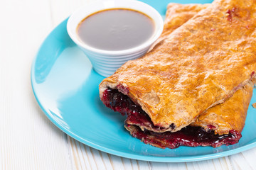 Baking, cherry strudel in a plate