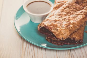 Baking, cherry strudel in a plate
