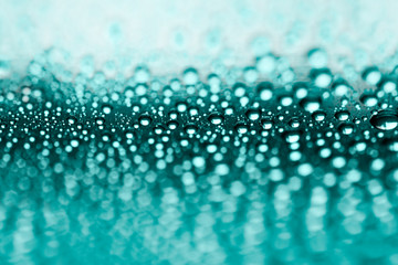 Texture water drops, blue green background