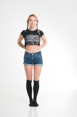 Fototapeta premium Girl with pigtails isolated on white background