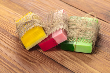 Obraz na płótnie Canvas Colored handmade soap in a vintage packaging