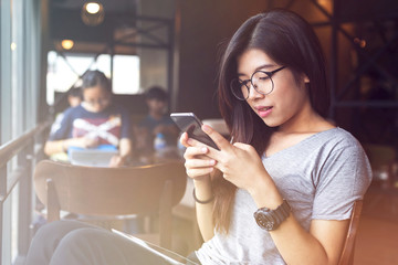 Young woman enjoying social online connection on cellphone