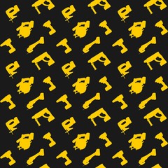 Seamless pattern yellow power tools on the dark background