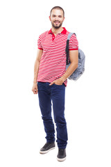 Handsome young man holding a backpack, isolated on white background