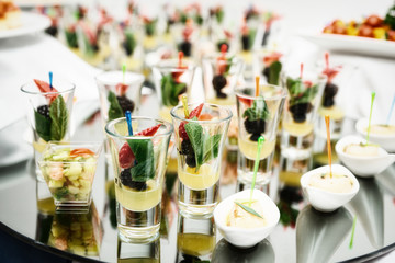 Berry dessert in shot glasses, toned