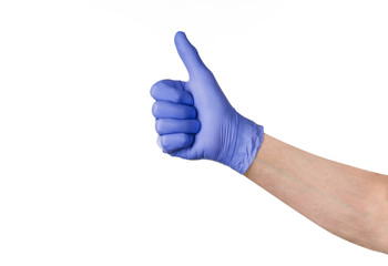Male hand in blue cleaning latex glove isolated on white background. Closeup photograph with copy space. Backdrop for advertising, packaging or concept.