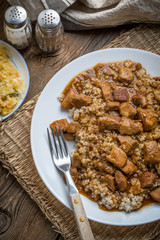 Barley groats with stewed meat.