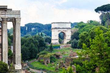 Fototapeta na wymiar The Iconic Arch of Titus on the Via Sacra in Roman Forum
