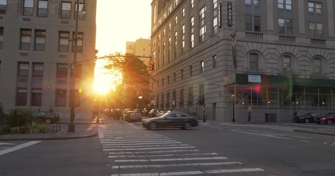 A sunset establishing shot of traffic on Boerum Place street in Brooklyn.  	