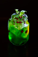 refreshing cocktail with lime, lemon and mint