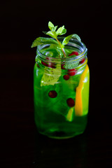 refreshing cocktail with lime, lemon and mint