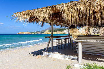 Greek tavern on the sea coast. Firiplaka beach located on the south coast of Milos. Cyclades, Greece.	