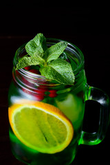 refreshing cocktail with lime, lemon and mint