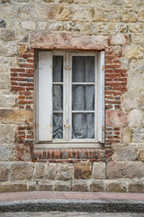 Old house window in brick