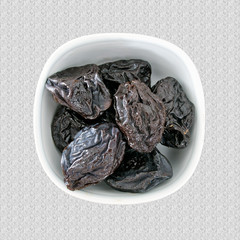 Serving of dried prunes, plums, Natural laxative.