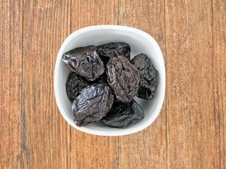 Portion of dried prunes, plums, Natural laxative.