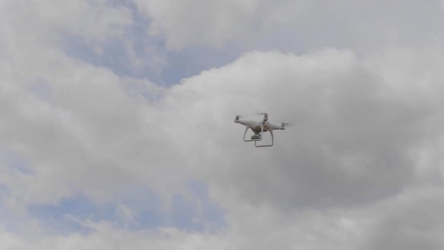 Modern drone is flying. UltraHD stock footage.