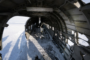 Interior of plane wreck on snow covered landscape, Iceland, Europe.