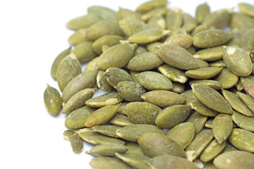 Roasted pumpkin kernels isolated on white background