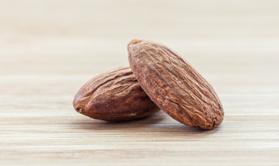 almond seed on vintage wooden table