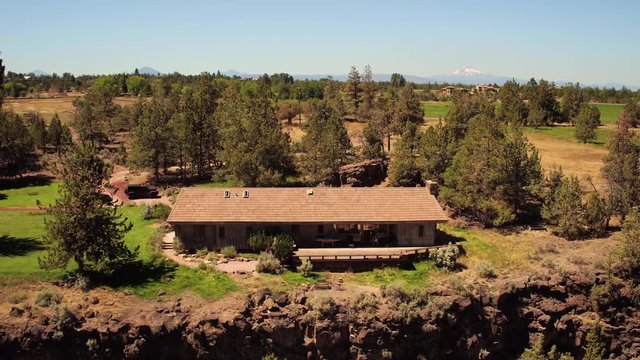 Oregon Aerial v12 Flying low around vacation house at Smith Rocks area