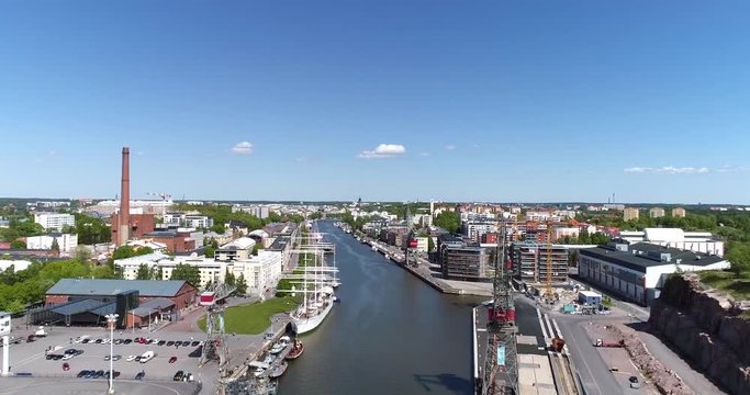 Aurajoki, Cinema 4k aerial view of a flight above aurajoki river, on a sunny summer day, in Turku, Finland