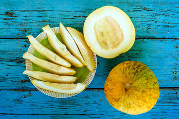 cantaloupe whole and sliced in the plate