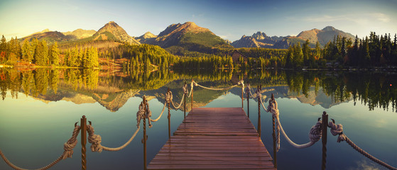 Panorama of high resolution mountain lake Strbske Pleso in Slovakia,vintage retro color tone