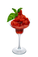 Watermelon smoothie in wide glassdecorated with spinach leaves isolated on white
