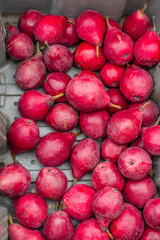 Display of fresh red pears at market