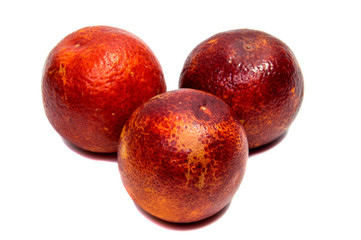 Half of bloody orange with leaf isolated on a white background