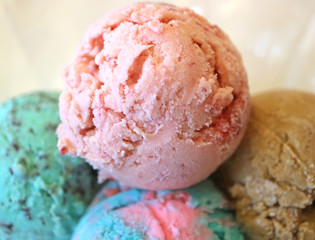 Close-up of piled up beautiful color ice cream scoops with selective focus 