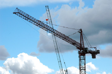 Tall crane at a construction site outdoors.