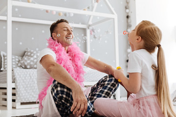 Enchanting original girl making her dad laugh