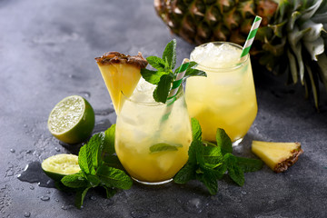 Cold pineapple drink with crushed ice, lime and mint - 160438169