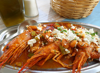 Sauteed Shrimp with Tomatoes, Olives and Feta Cheese, Greek Seafood at Mykonos Island, Greece 