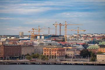 Fototapeta na wymiar STOCKHOLM, SWEDEN - SEPTEMBER 16, 2016: Skyline of central part of city with developing of new buildings and cranes