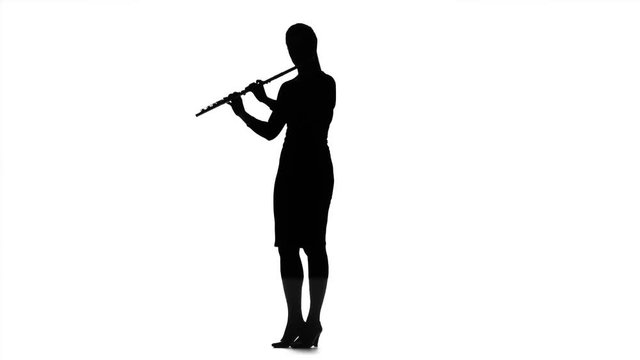 Girl playing on flute. Silhouette on white background, slow motion