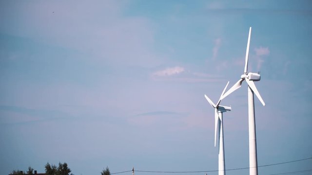 Wind energy turbines are one of the cleanest, renewable electric energy source. Electricity is generated by electric generators hidden inside turbine.