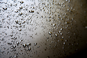 in a car after the rain some drops of water