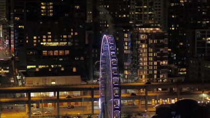 Seattle Aerial v111 Closeup flying low shot of waterfront ferris wheel at night with downtown views 4/17