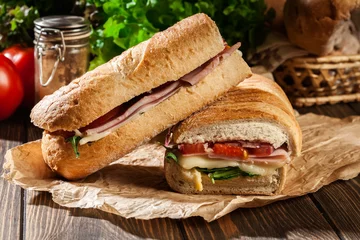 Photo sur Plexiglas Snack Toasted panini with ham, cheese and arugula sandwich