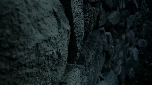 nostalgic stone wall at night.