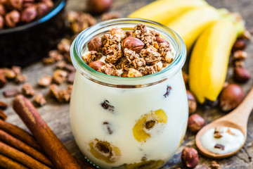 Serving of Yogurt with  Muesli, Banana and Nuts