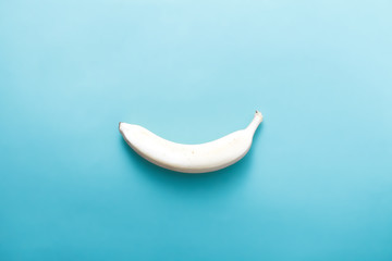 White banana on pastel blue background. Minimal fashion, flatlay , top view. Albino Different Creativity Creative Thinking Ideas Concept